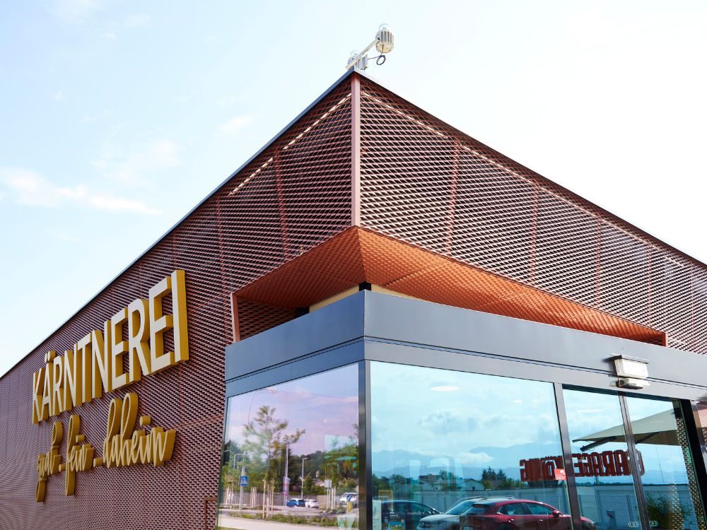 Fassadengestaltung mit Metall und Farbe: ProMetall-Referenz Kärntnerei Klagenfurt